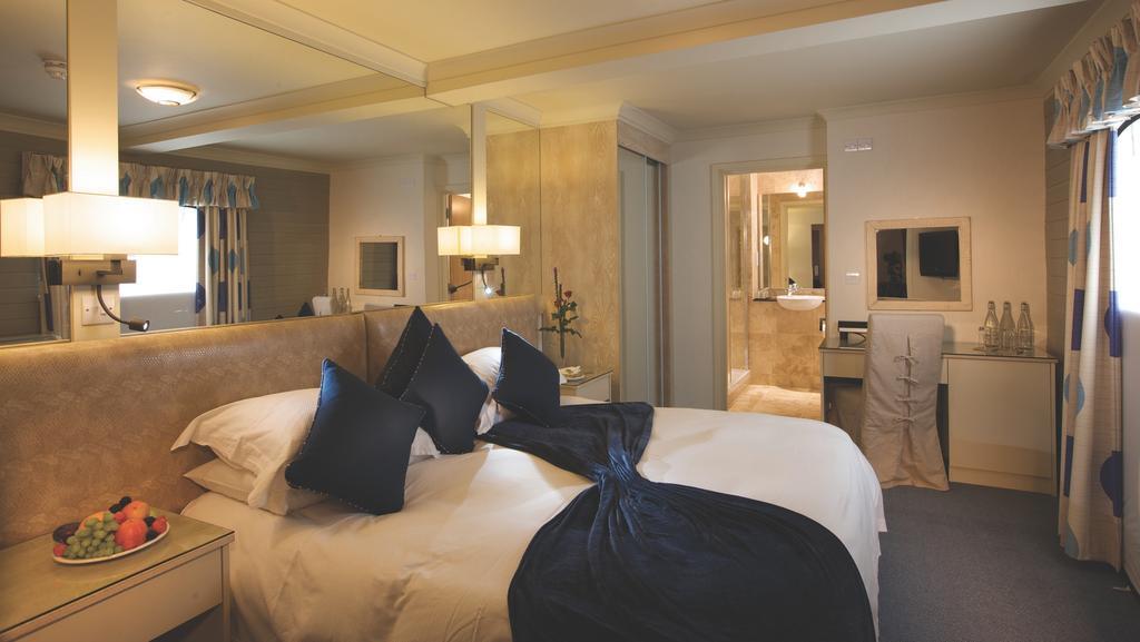 Cobo Bay Hotel Castel Kamer foto